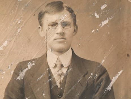 Document with missing corners before restoration